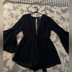 She & sky plunge bell sleeve romper in navy